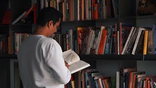 A Man Reading A Book  Stock Video Free To Use HD 4K [upl. by Alyahs673]