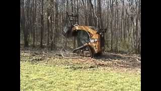 Forestry mulcher on a CAT skid steer clearing our property [upl. by Klenk]