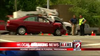 Hearse overturns in funeral procession [upl. by Ardnuahs]