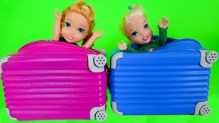 Elsa and Anna toddlers buy suitcases to go on holidays [upl. by Yleak]