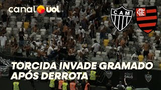 ATLÉTICO MG X FLAMENGO TORCEDORES ARRANCAM GRADES E INVADEM CAMPO APÓS FINAL NA ARENA MRV [upl. by Steffin839]