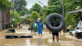 Myanmar residents flee severe floods shelter in a school  AFP [upl. by Yenhoj]