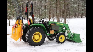 John Deere 3025e Pushing Snow Uniforest 35M providing ballast [upl. by Golding]