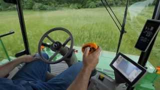 John Deere W235 Windrowers Video [upl. by Nicol539]