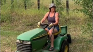 Just my good lady driving the old lt155 picking up wood both hard working gals JohnDeere [upl. by Craw]