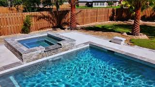 Pool Pro Inc custom gunite with spillover hot tub [upl. by Akemej317]