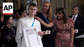 Ukrainian Olympic athletes celebrated at Paris town hall event [upl. by Niko921]