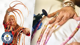 Cutting The Worlds Longest Fingernails  Guinness World Records [upl. by Alpert]