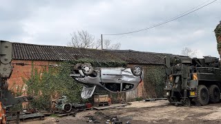 Tearing a car in half with two lorries [upl. by Tiemroth]