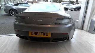 Aston Martin V12 Vantage Start up Sound Rev amp Drive out of Showroom [upl. by Aihsirt]