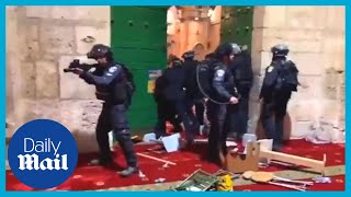 Israeli police clash a SECOND time with Palestinians in AlAqsa [upl. by Earas226]