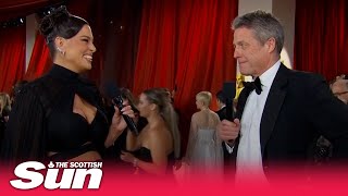 Hugh Grant gives a hilariously awkward Oscars red carpet interview [upl. by Llenaej]