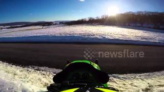 Rider survives highspeed snowmobile crash in US [upl. by Hillie900]