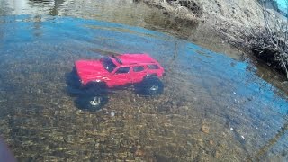 Rc axial ax10 jeep cherokee in deep water brushless 1100 kv74 volts first test [upl. by Asia195]