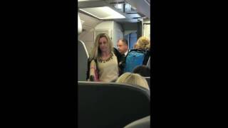 RAW American Airlines flight attendant says quothit mequot to angry passenger [upl. by Clevey]