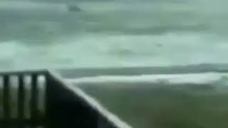 Man SURFS through giant waves during hurricane IRMA meme [upl. by Mendel]