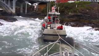 Coast Guard Station Depoe Bay lifeboat tows another lifeboat through quotThe Holequot [upl. by Frankhouse]