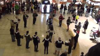 Bagpipe Holiday Flash Mob 2014 [upl. by Kentigerma]