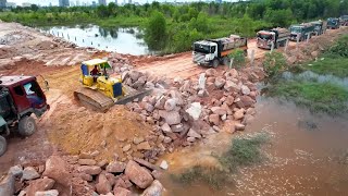 Extremely Skill Construction Machines Operator Dozer Push Big Rock Stone Dump Truck Unloading [upl. by Aisinoid123]