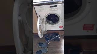 Putting slippers in washing machine [upl. by Eilyak613]