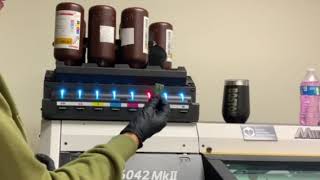 How to TUTORIAL change ink on a Mimaki UV printer changeink mimaki6042 lh100 uvprint [upl. by Nairret]