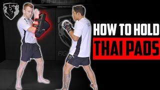 How To Hold Thai Pads PunchesKicksKneesElbows [upl. by Clevey332]