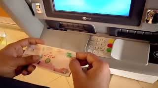 HOW TO DEPOSIT CASH IN EMIRATES NBD ATM MACHINE video [upl. by Aicilehp]