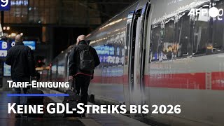 Keine weiteren Streiks Bahn und GDL einigen sich auf 35StundenWoche ab 2029  AFP [upl. by Ainex349]