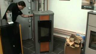 Rika Pellet stove loading pellets [upl. by Pirali637]