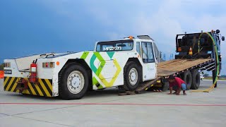 Schopf Pushback Aircraft Tow Tractor Transport By Self Loader Trucks Isuzu Giga FVZ285PS [upl. by Eile862]