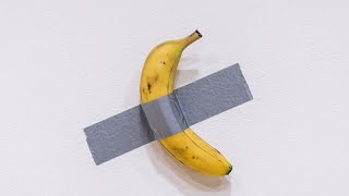 Famous ducttaped banana sells for €58 million at art auction [upl. by Lukash]