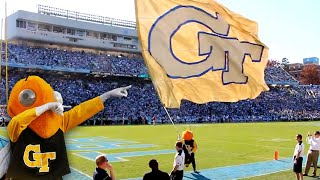 Georgia Techs mascot Buzz celebrates a touchdown with the school flag in the end zone at UNC [upl. by Keung]