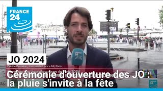 Cérémonie douverture des JO  la pluie sinvite à la fête • FRANCE 24 [upl. by Ahtrim150]