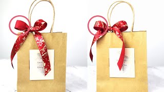 How to make a bow on a gift bag with singleonesided ribbon [upl. by Lehet]