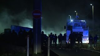 Police and migrants clash in Calais Jungle [upl. by Inanaup51]