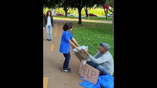 Homeless man vs candy floss seller kids react differently shorts [upl. by Ragan]