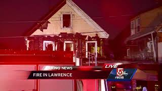 Multifamily home burns in Lawrence [upl. by Gombach]