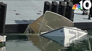 Crane drops barge onto boat in East Boston marina [upl. by Shank373]