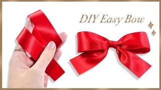 How to tie the perfect bow  DIY ribbon bow  How to make simple satin bow  Gift Wrapping Land [upl. by Aihsyak857]