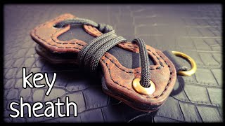 How to make a very cool key sheath from leather and paracord [upl. by Oirrad]