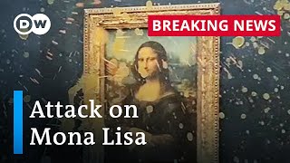 Activists deface Leonardo Da Vincis Mona Lisa in Paris  DW News [upl. by Middlesworth]