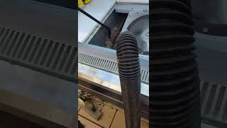 Cleaning evaporator pans on a reach in dairy cooler [upl. by Arytas575]