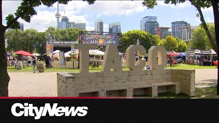 Toronto hosts poutine eating contest taco festival [upl. by Service]