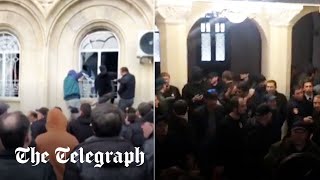 AntiRussia protesters storm parliament in Georgian breakaway region of Abkhazian [upl. by Edge]