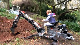 Blonde Women Operating the Jansen MB300 Mini Excavator [upl. by Arimat]