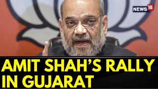 Lok Sabha Elections 2024  Home Minister Amit Shah Holds A Mega Roadshow In Gujarat  News18 [upl. by Mundt]