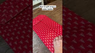 How to gift wrap a water bottle christmas christmasgiftwrapping christmas diy [upl. by Notsle171]