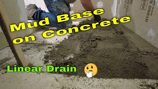 How to prep and install a mud base for a linear drain over an uneven concrete floor [upl. by Nyrrat582]