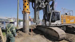 Liebherr LB 24 and LB 28 installing seacant pile wall using segmental casing [upl. by Aynot866]