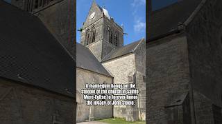 A mannequin hangs on the steeple of the church in SainteMereEglise to forever honor John Steele [upl. by Nigam670]